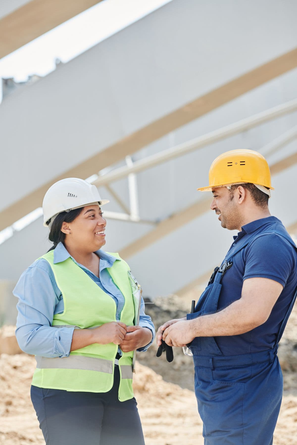 Field technicians reviewing project documentation on site